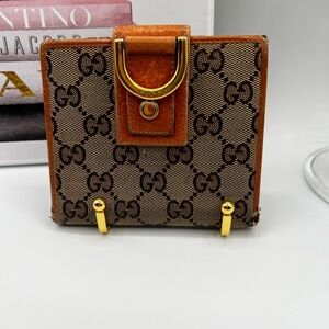 Gucci Brown and Gold Monogram Wallet